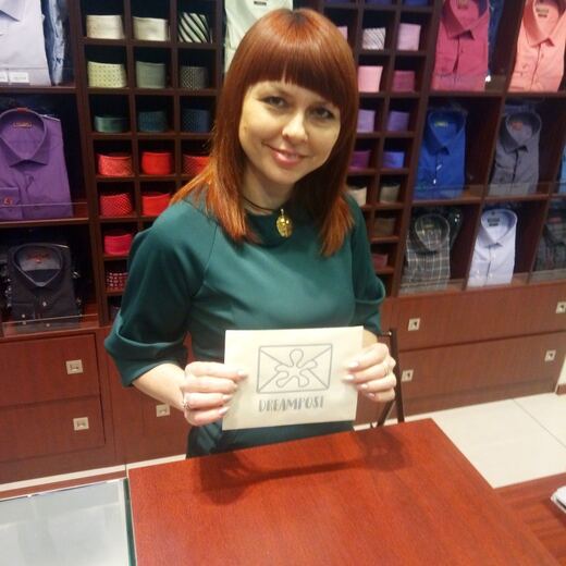 A recipient at a desk with a delivered envelope.